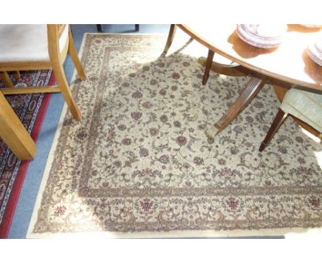 A CREAM GROUND BELGIAN CARPET, 160 cms x 227 cms and a similar red ground example, 170 cms x 230 cms
