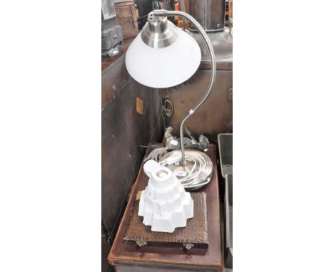 AN EDWARDIAN JELLY MOULD, a vintage leather suitcase, a print of Portland and various items