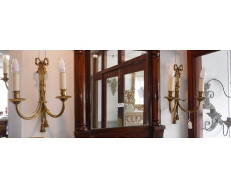 A SET OF THREE NEOCLASSICAL STYLE 'TIED RIBBON' BRASS WALL LIGHT BRACKETS