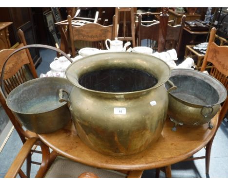 A VICTORIAN  BRASS COOKING POT with an iron handle, a large brass jardiniere and a planter (3)