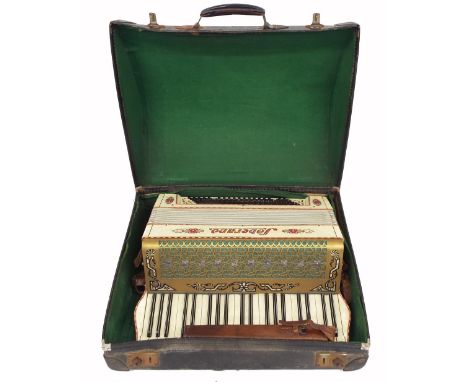 Soberano piano accordion, case; together with a Gisborne Class A ebonite piccolo within an old brown leather Boosey &amp; Co 