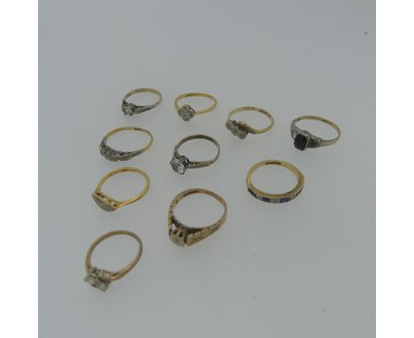 A 9ct yellow gold Ring, the centre illusion set with a small diamond point, with diamond cut shoulders, Size M, together with