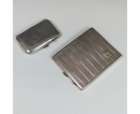 A George V silver Cigarette Case, hallmarked Birmingham, 1927, of hinged rectangular form with engine turned decoration, vaca
