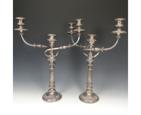 A pair of silver plated three light Candelabra,&nbsp;foliate decoration with scroll arms, approx. 53cm high&nbsp;(2) 