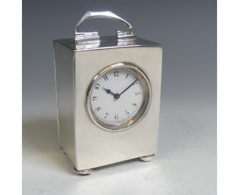 Liberty &amp; Co.; A George V silver miniature Timepiece, hallmarked Birmingham 1911, of plain rectangular form with bun feet