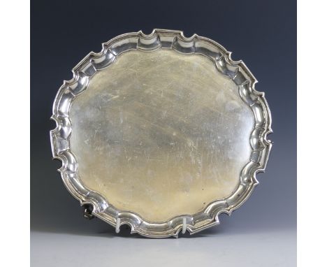 A George V silver Salver, by William Hutton &amp; Sons Ltd, hallmarked Sheffield, 1935, of plain circular form with shaped ri