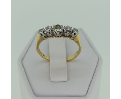 A graduated five stone diamond Ring, the central stone approx. 0.25ct, total weight approx. 0.6ct, all mounted in 18ct yellow