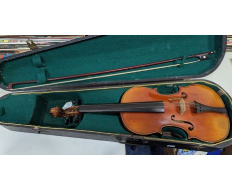 An early 20th Century Stradivarius copy Violin, with two-piece back, bears label “Copie de Antonius Stradivarius Cremonensis 