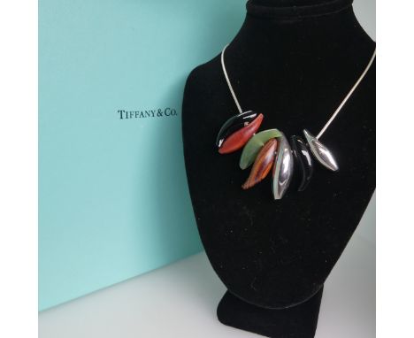 Tiffany &amp; Co;, A Frank Gehry 'fish' design Necklace,&nbsp;with seven wood, jade and sterling silver drops on a silver sna