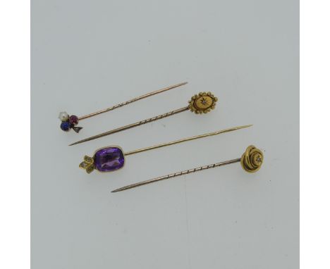 An antique Trefoil Stick Pin, set ruby, diamond and half pearl, with diamond point, together with a stick pin with amethyst a