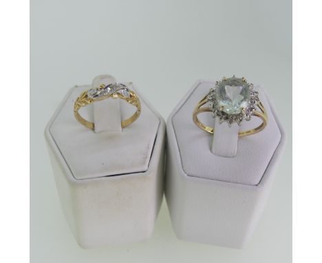 A small three stone diamond Ring, mounted in 9ct yellow and white gold, Size O½, in heart shaped ring box, together with a 9c