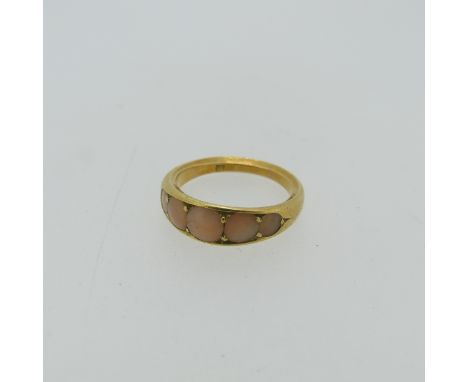 A graduated five stone coral Ring, the pale pink or 'Angel skin' corals mounted in 18ct yellow gold, Size M, approx. total we