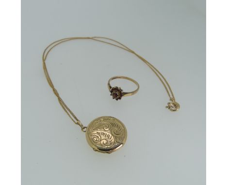 A 9ct yellow gold circular hinged Locket, the front with foliate decoration, 21mm diameter, on a 9ct gold trace chain, 51cm l