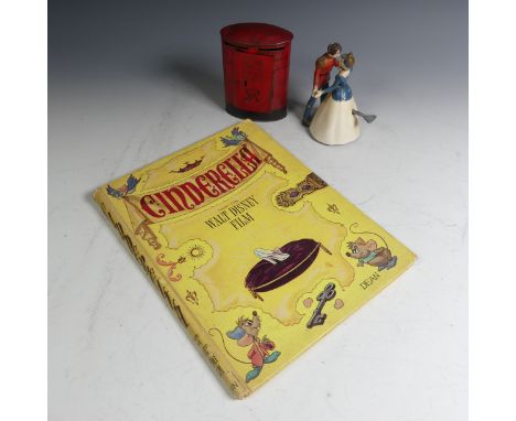 A Wells Brimtoy clockwork dancing Cinderella and Prince Charming toy, and ‘Cinderella’ from the Walt Disney Film, pub. Dean, 