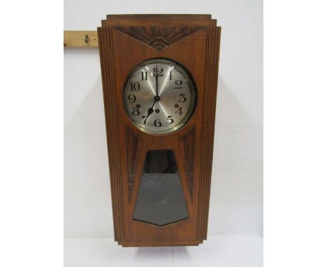 Art deco style wall clock with key and pendulum