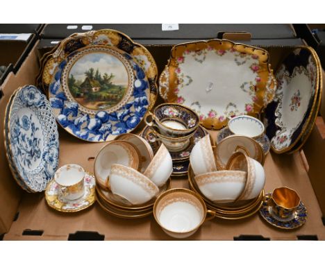 A Victorian cabinet plate painted with rural scene on a blue and white printed ground of apples, to/w a pair of Meissen onion