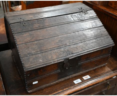 A 17th/18th century oak slope-top Bible box, 48 cm wide, to/w a small pine trunk (2) 