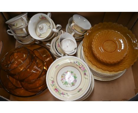 A vintage 1970's amber glass fruit/dessert set comprising large bowl and eight smaller matching examples, probably Italian Bo