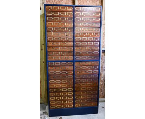 A contemporary part blue painted haberdasher's bank of forty four drawers, each applied with four brass label plates, 97 cm w