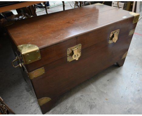 A Chinese hardwood and brass mounted blanket chest with camphor lined interior and bracket feet, 102 cm wide x 50 cm deep x 5