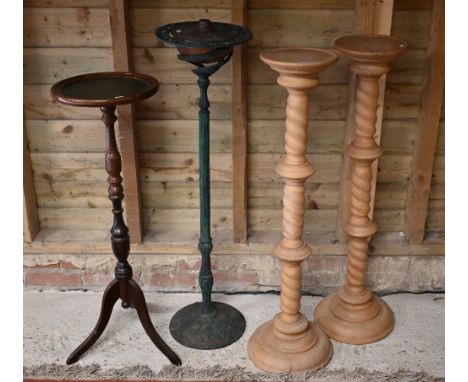 A pair of beech barley-twist torchere stands, 102 cm high, to/w reproduction mahogany example with leather top and a copper o
