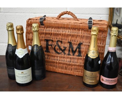 Fortnum &amp; Mason wicker hamper with leather straps, to/w two bottles of Fortnum &amp; Mason Brut Reserve Champagne, one Fo