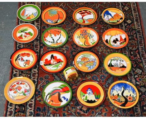 A set of sixteen Wedgwood limited edition plates from 'The Bizarre World of Clarice Cliff' series, 20.5 cm diameter, to/w an 