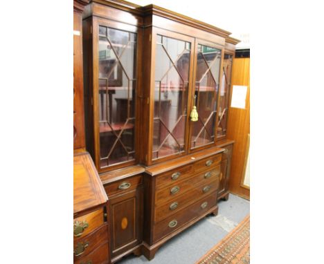 A good George III design inlaid mahogany break front library bookcase with dentil inlaid cornice, four astragal glazed doors 