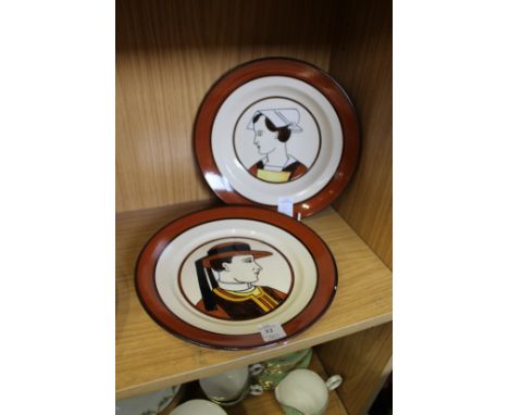 A pair of Quimper portrait plates.