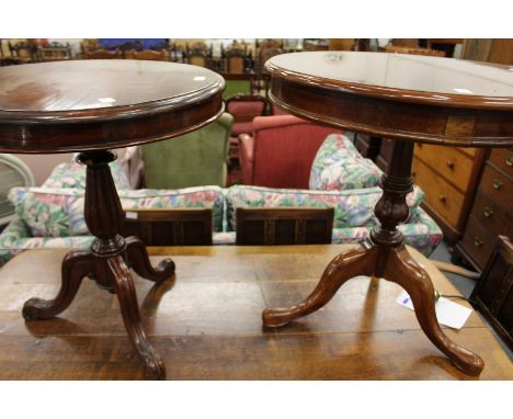 Two mahogany tripod tables.