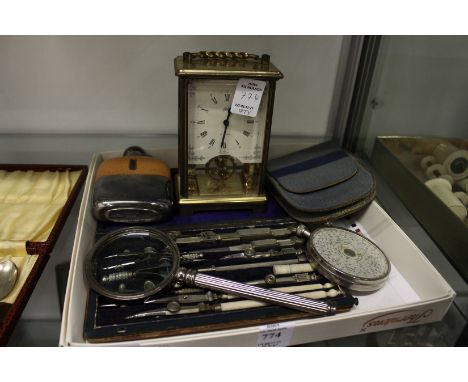 A hip flask, a carriage clock, drawing instruments etc.