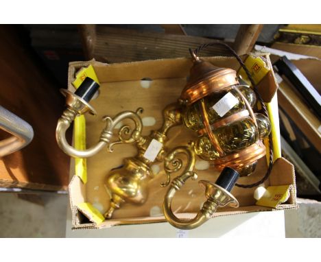 A brass two branch wall light and a hanging lantern.