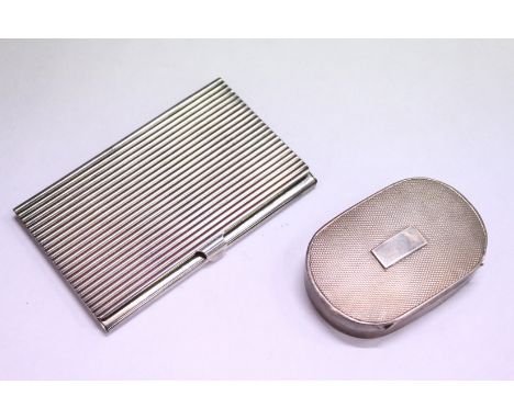 An engine turned silver snuff box and a plated calling card case.