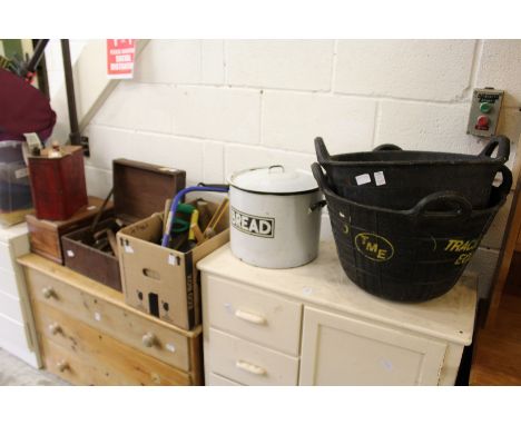 An old petrol can, various tools, an enamel bread bin etc.
