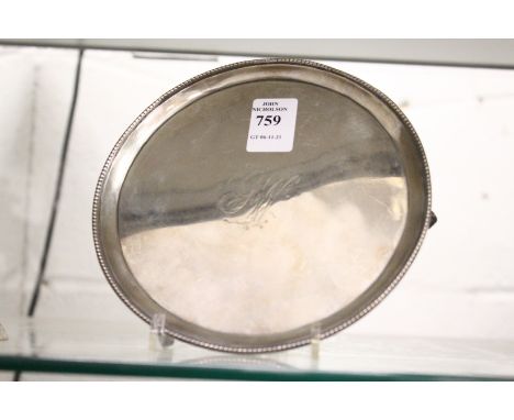 A George III circular silver waiter.