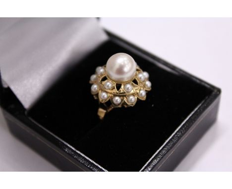 A 14ct gold and pearl dress ring.