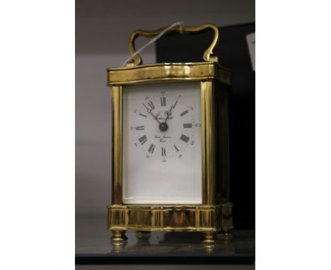 A good brass carriage clock with original case.