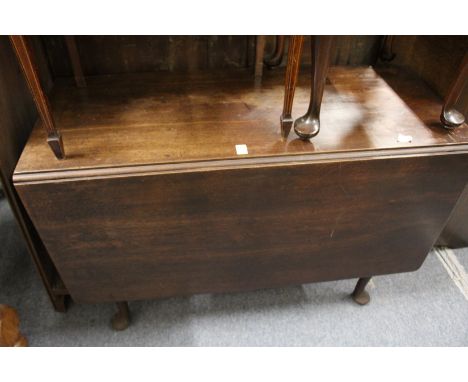 A George III mahogany drop leaf gate leg dining table.