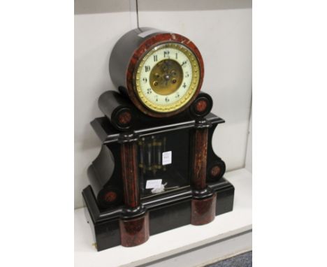 A good large Victorian slate mantle clock with mercury pendulum.