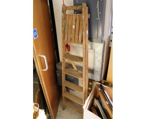 An old wooden step ladder.