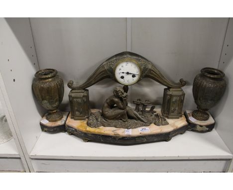 An Art Deco clock garniture.