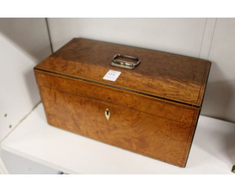 A 19th century satinwood two division tea caddy with mixing bowl.