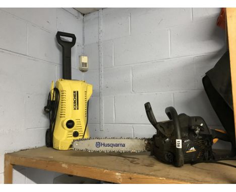 A chainsaw and a Karcher
