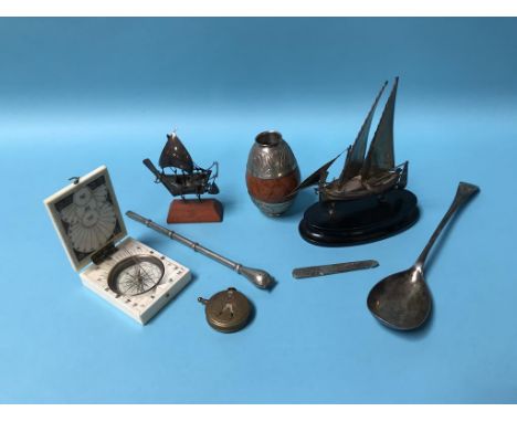 A silver serving spoon, maté spoon and compass etc.