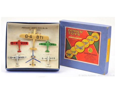 Dinky 60 Aeroplanes Gift Set to include Imperial Airways - gold, with "GA BTI" lettering; Low Wing Monoplane - red with "G-A 