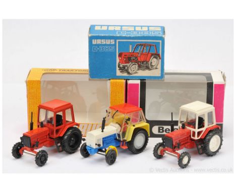 Group of Tractors (1) Russian made Belarus - red including cab, black; (2) another but red, cream, white, black and Eastern E