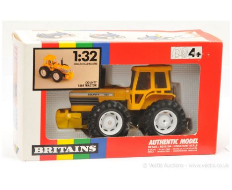 Britains 9521 County 1884 Tractor - yellow, grey, white, figure driver - Near Mint (couple of very minor marks on chassis edg
