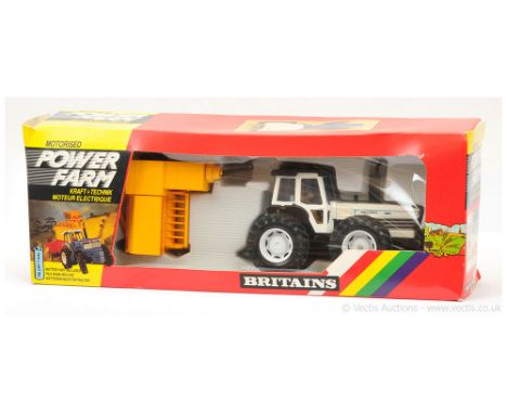 Britains 9386 Power Farm County 1884 Tractor - finished in white, black, figure driver with New Holland Baler finished in yel