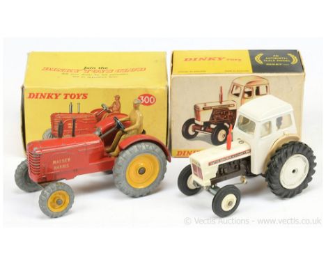 Dinky 300 Massey Harris Tractor - red, yellow metal wheels, light tan figure driver - Fair still a bright example in a genera
