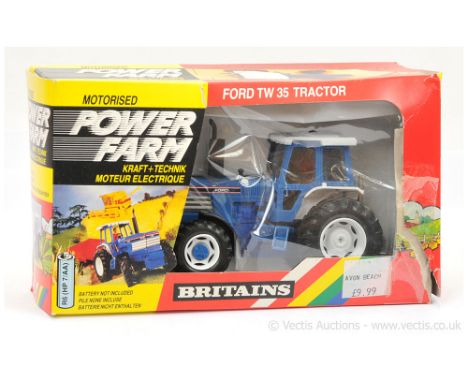 Britains 9321 Power Farm Ford TW-35 Tractor - finished in blue, pale grey, white, black with figure driver - Near Mint in a F